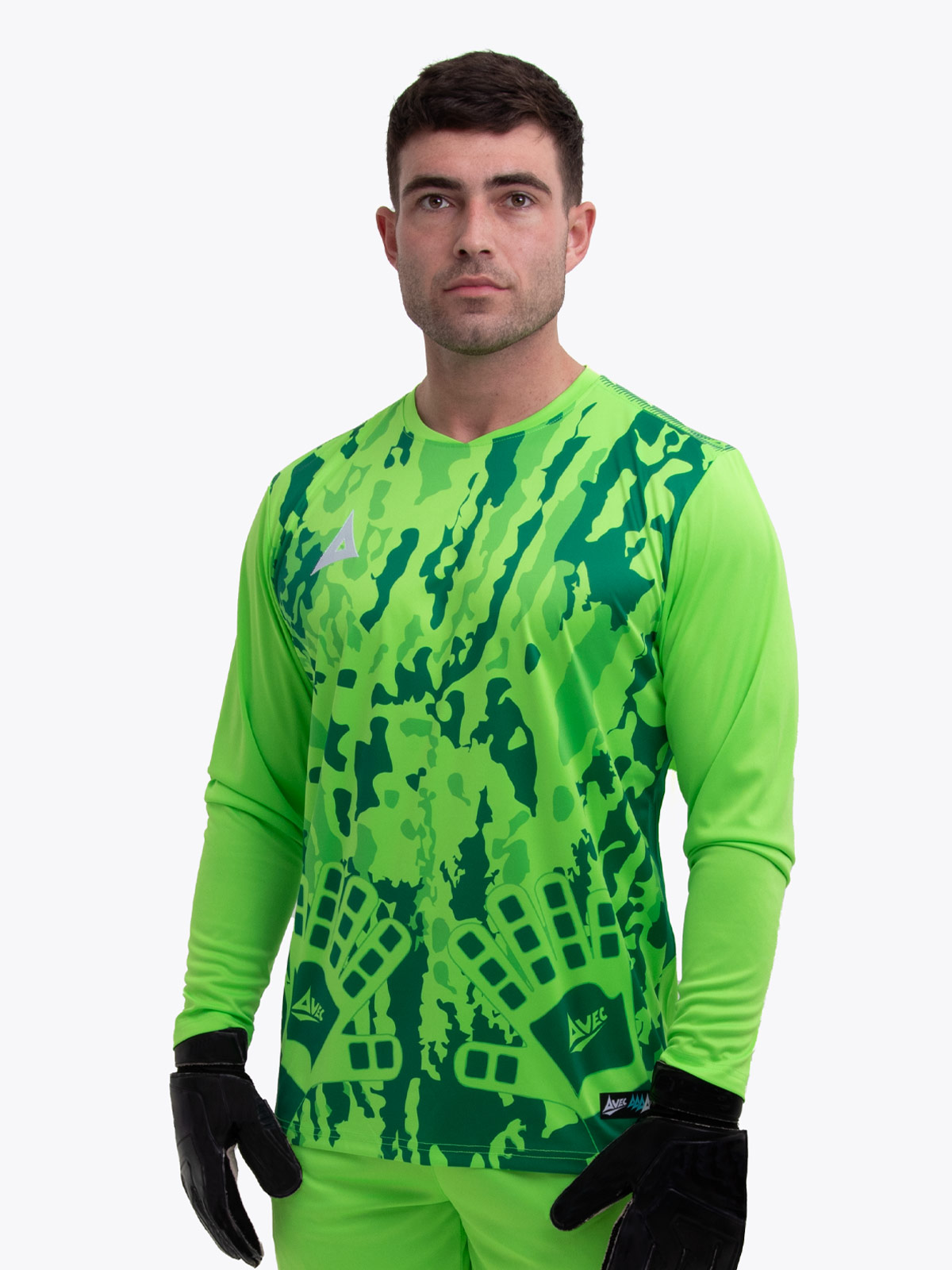 a model wearing a goalkeeper kit in neon green